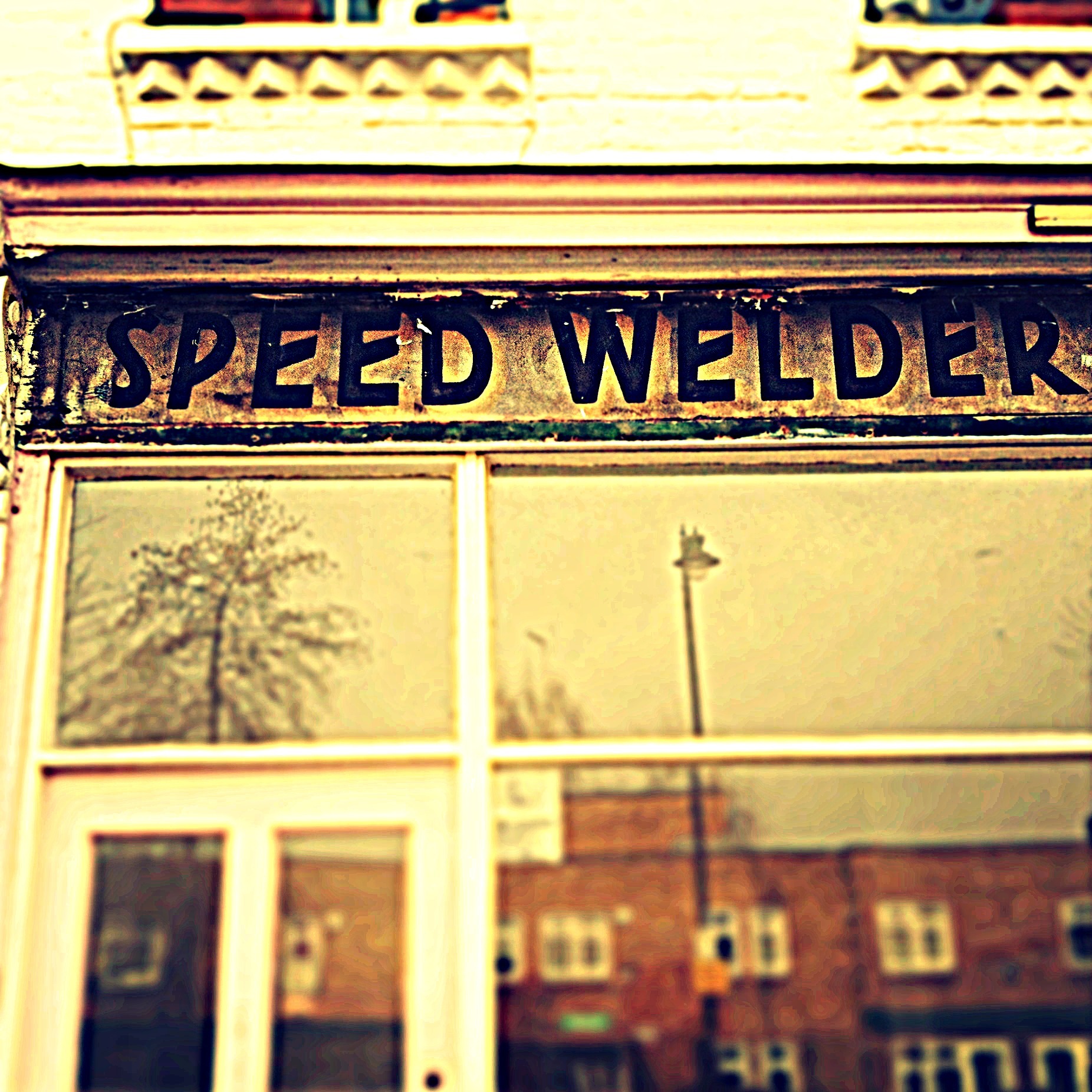 Speed Welder sign Battersea