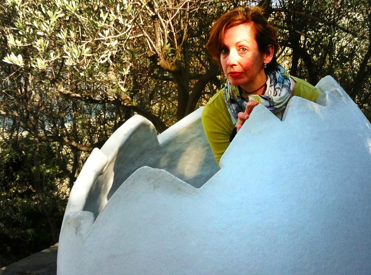posing in an egg in Dali's garden