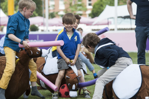 Kids on spacehoppers at Polo in the Park on jenography