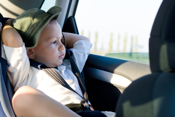 boy in car, via Shutterstock