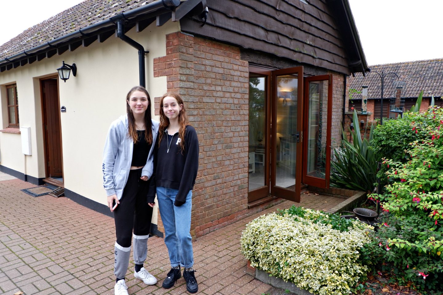 girls outside Linney Cottage