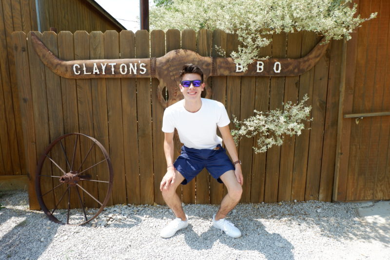diner posing at Clayton's BBQ, Graham